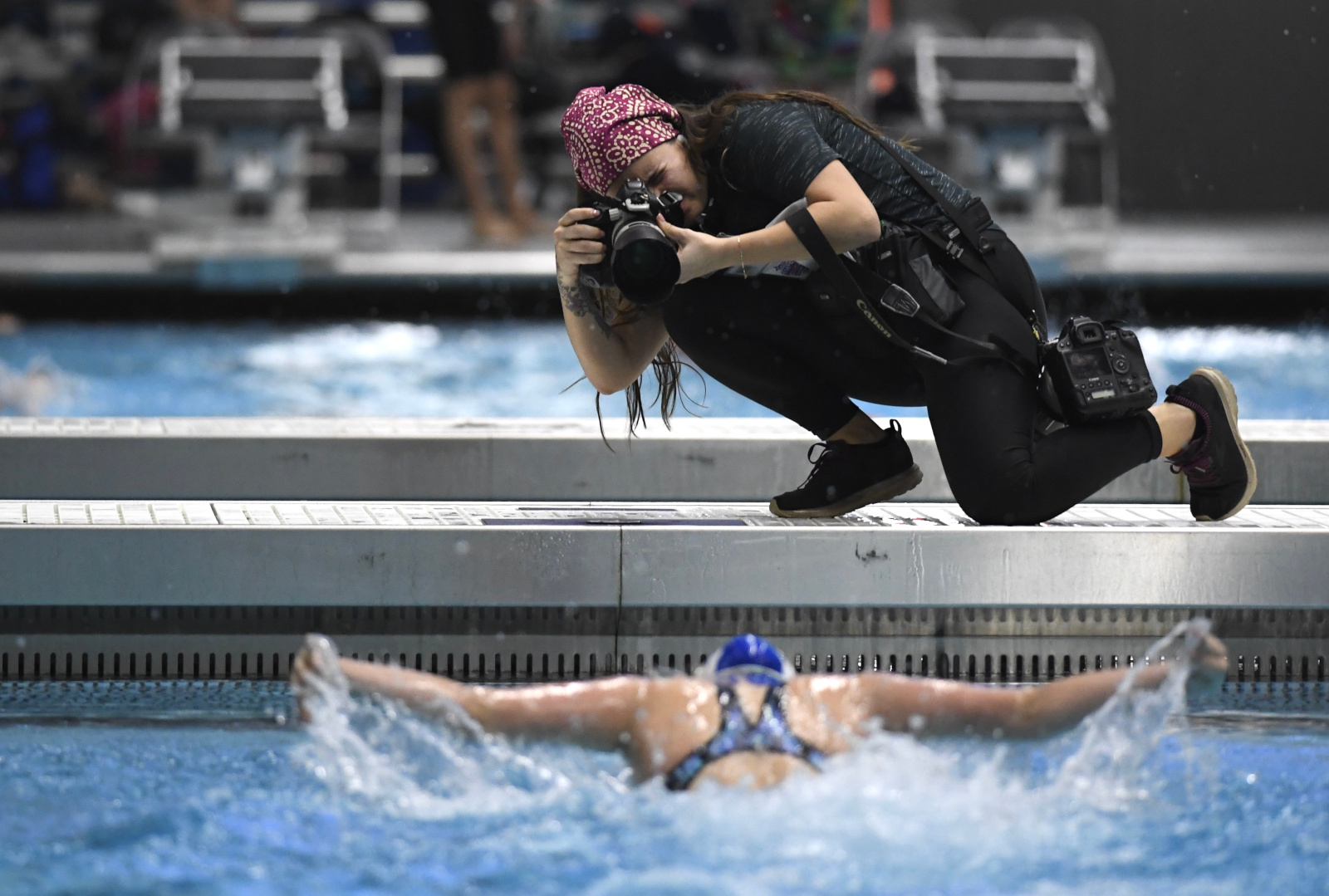 Photographer at swim meet