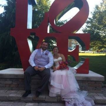 Couple at sculpture