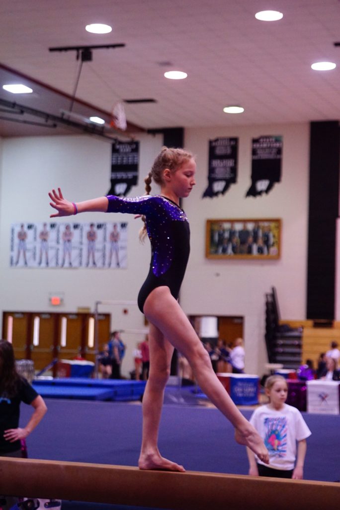 girl on beam