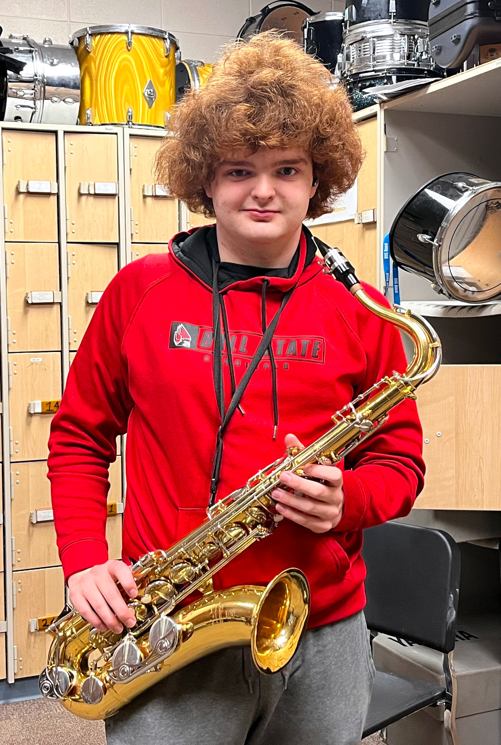 Band member with saxophone