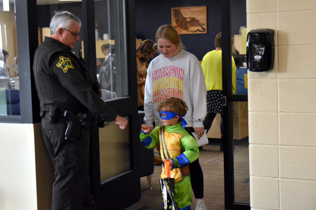 Officer and trick or treater