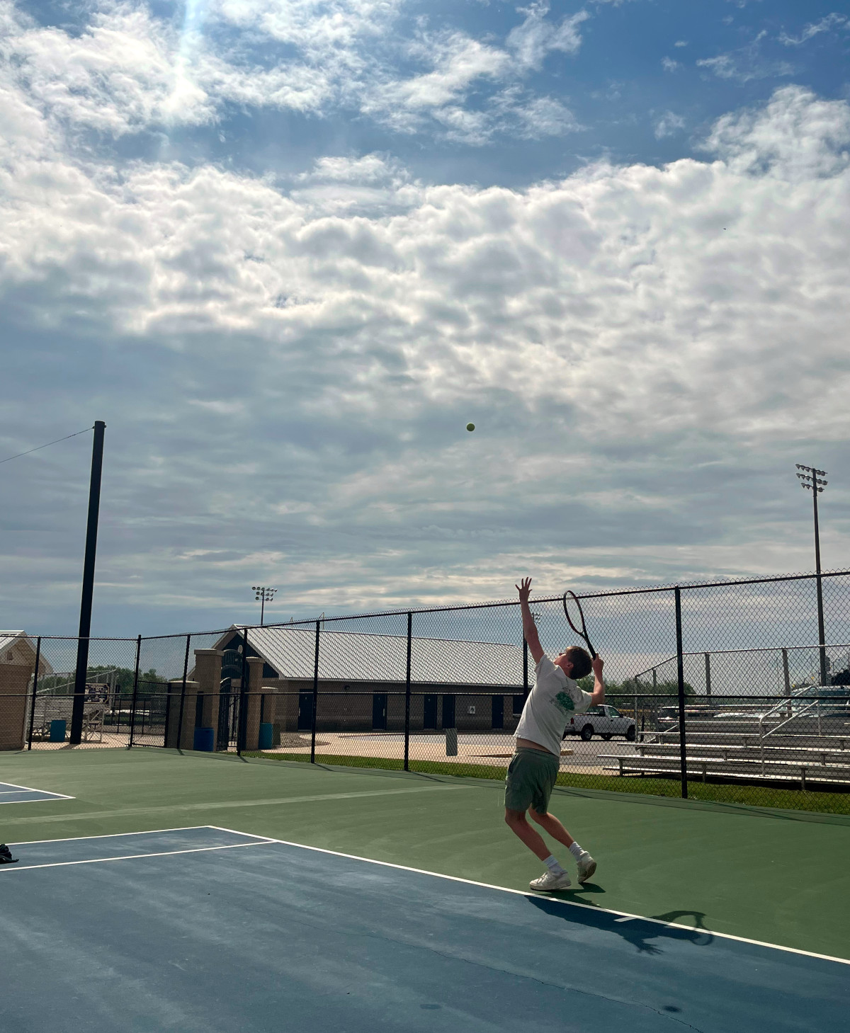 Tennis player serves