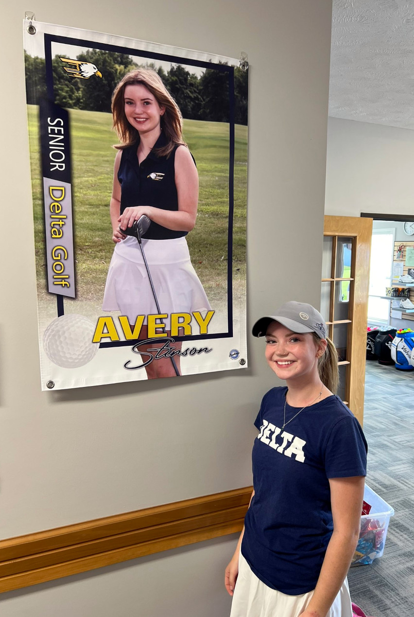 Golfer with sign