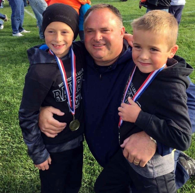 Bronson Edwards, Cooper Bratton, and Dave Edwards pose together