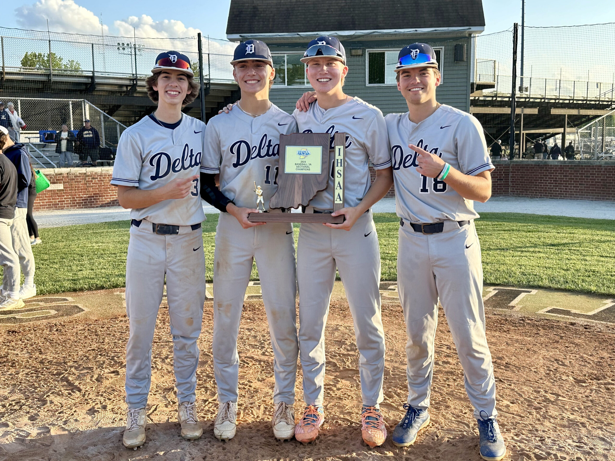 Baseball players with trophy